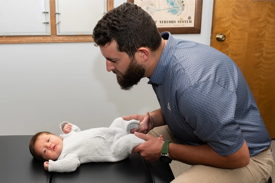 Chiropractor Thomasville NC Patrick Jackson With Baby