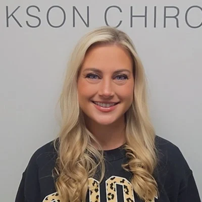 Emily smiling, she has blonde hair.